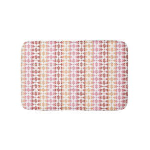 Geometrische rode ikat strepen patroon badmat