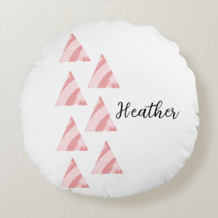 Geometrische triangels en naam rond kussen