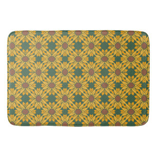 Geometrische zonnebloempatronen op donkergroen badmat