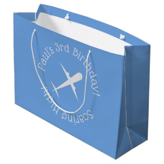 Gepersonaliseerd vliegtuig op blauw, stijgend hoog groot cadeauzakje