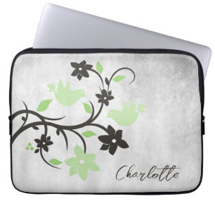 Gepersonaliseerde laptophoes met een lichte groene laptop sleeve