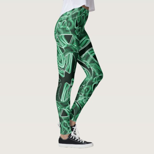 Geplette en overlappende groene acryltapecutouts leggings (Rechts)