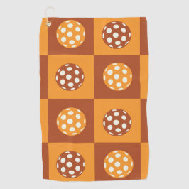 Geruite Sinaasappels en bruine pickleball ballen Golfhanddoek