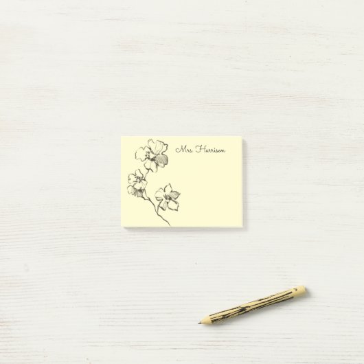 Geschetste bloem post-it® notes (Op bureau)