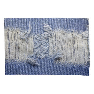 Gescheurd blauw denim: jeans textuur. kussensloop