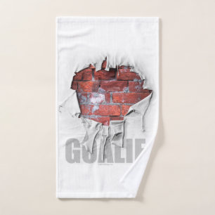 Gescheurde bakstenen muur voetbal goalie badhanddo bad handdoek