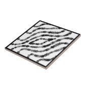 Gespannen zwarte gevlekte dozen op witte moderne k tegeltje (Zijkant)