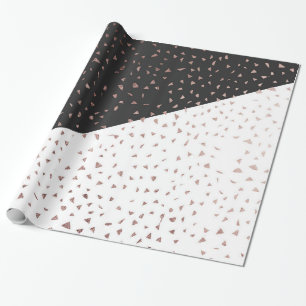 Gespikkelde goudvlokken op zwart-wit cadeaupapier