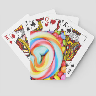 Gestreepte lipop en veelkleurige moerassen pokerkaarten