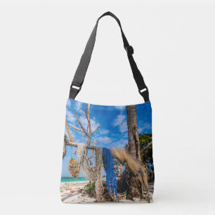 Gevist netten die op het strand drogen crossbody tas