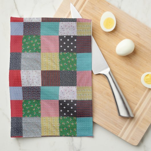 gevlekte vierkanten van kleurrijk patchwork theedoek (Quarter Fold)