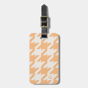Gewaagd modern sinaasappel houndstooth met bagagelabel