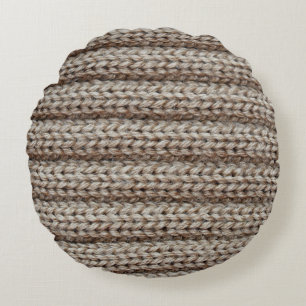 Gewone gebreide stof, bruine textuur. rond kussen