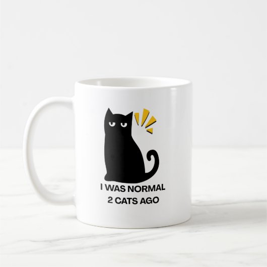 Gewone kat  koffiemok (Links)