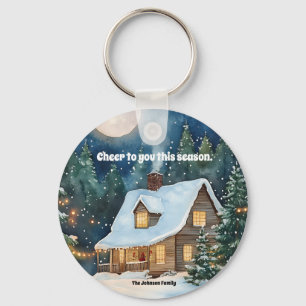 Gezellig kersthuisje bedekt met sneeuw sleutelhanger