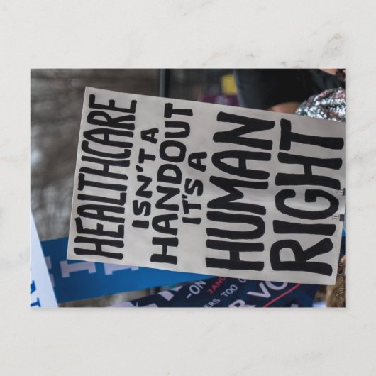 Gezondheidszorg is geen handout Briefkaart (Voorkant)