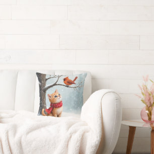 Ginger Kat Kijken naar een Winter Kardinaal Kussen