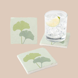 Ginkgo laat  achtergrondkleuren achter stenen onderzetter