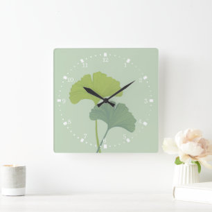 Ginkgo laat achtergrondkleuren achter vierkante klok