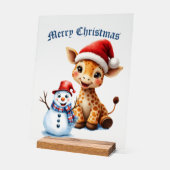 Girafe de caricature mignonne avec Santa Hat & Sno (Angle)