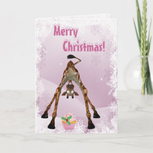 Girafe drôle et carte de Noël rose de petit gâteau