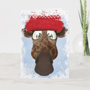 Girafe mignonne dans la carte de Noël de casquette