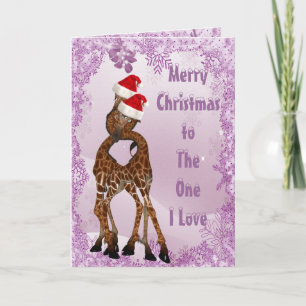Giraffes sous la carte de Noël mistletoe pourpre