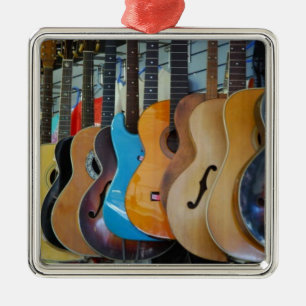 Gitaar in overvloed metalen ornament