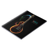 Gitaarmuziek op notitieboek (Linkerzijde)