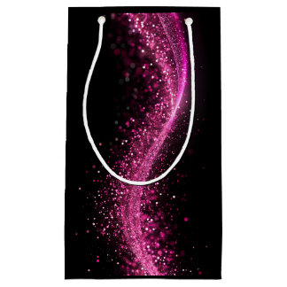 Glanzende papieren zak in roze pailletten is zwart klein cadeauzakje