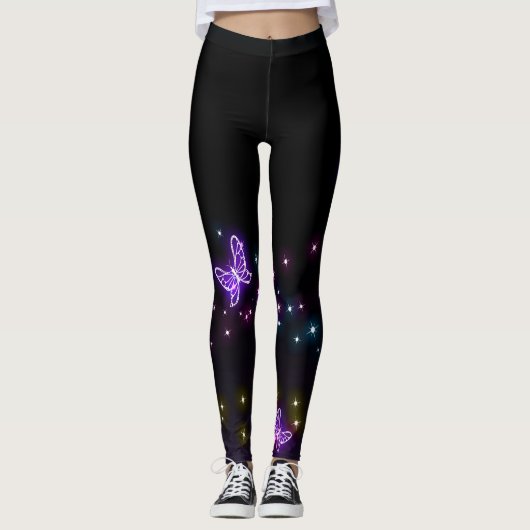 Glanzende vlinders op zwarte achtergrond leggings (Voorkant)