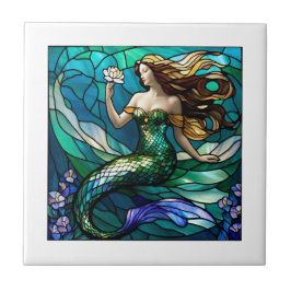 Glas in lood zeemeermin bewondert een bloemetje tegeltje