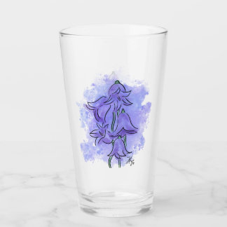 Glas met bloem van het grasklokje