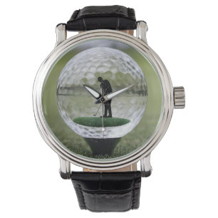 Glazen golfbal met golfspeler binnen, horloge