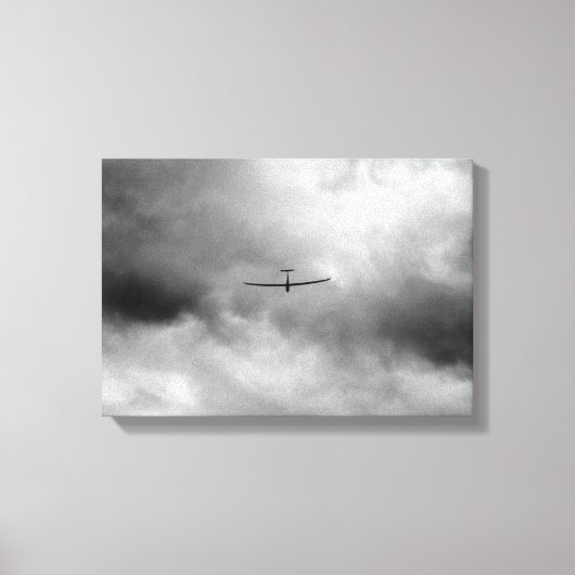 Glider vliegt in de grijze hemel canvas afdruk (Voorkant)