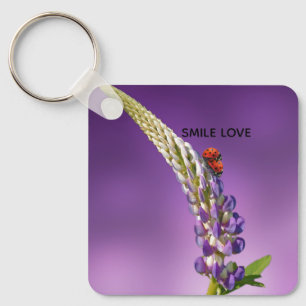 GLIMLACH LIEFDE SLEUTELHANGER