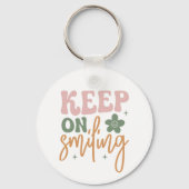 Glimlachende Inspirerend quote Sleutelhanger (Achterkant)