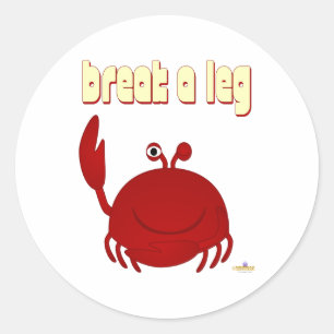 Glimlachende rode krab breekt een been ronde sticker