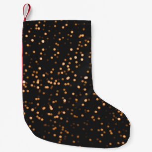 Glitter achtergrond gouden textuur kleine kerstsok