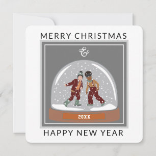 Globe des neiges avec patineurs de glace Carte de