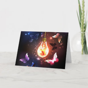 Gloeiende gloeilamp met nachtvlinders bedankkaart