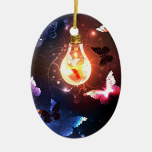 Gloeiende gloeilamp met nachtvlinders keramisch ornament