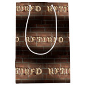 Gloeiende Neon Gepensioneerd Teken Op Een Bakstene Medium Cadeauzakje (Voorkant)