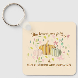 Gloeiende pompoen en herfst laat de vlakte van de  sleutelhanger