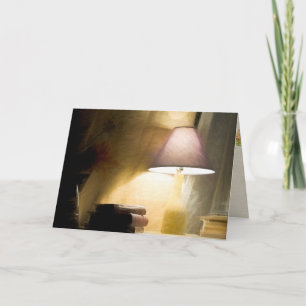 gloeilamp met een oude boekenimpressionisme kaart