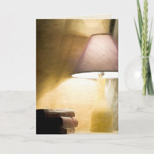 gloeilamp met een oude boekenimpressionisme kaart