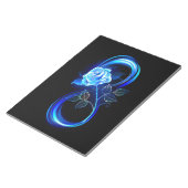 Glowing infinity with blue rose notitieblok (Schuin)