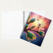 Glowing sunrise background with winged creature planner (Display)