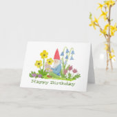 Gnome avec la carte d'anniversaire de livre de (Fleur jaune)