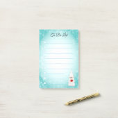 Gnome mignon sur un post-it turquoise et blanc (Sur un bureau)